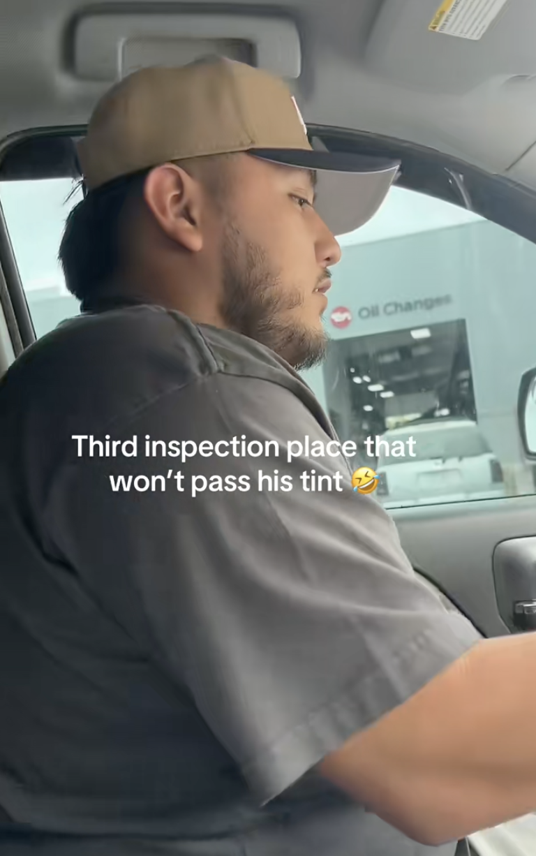 man sitting in a car